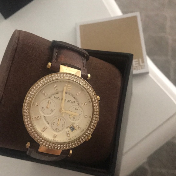 Brown leather Michael kors watch.